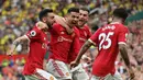 Setan Merah berhasil menang dengan skor 3-2 atas sang tamu, Norwich City. Ketiga gol yang dicetak MU merupakan buah karya dari sang penyerang gaek, Cristiano Ronaldo. (AFP/Paul Ellis)