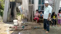 Warga Kampung Bantarjaya, Desa Bantarjaya, Kecamatan Rancabungur, Kabupaten Bogor, digegerkan dengan penampakan buaya di aliran Sungai Cisadane, Rabu (10/8/2022) (Liputan6.com/Achmad Sudarno)