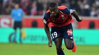 4. Nicolas Pepe  (Lille) - Mendengar rumor ketertarikan Manchester United, Lille sebagai klub pemilik Nicolas Pepe sudah siap melepasnya dengan banderol 80 juta euro yang dirasa bisa dipenuhi Red Devils. (Photo by Denis Charlet / AFP)