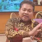 Anggota Komisi X DPR RI, Nuroji saat dikonfirmasi terkait pemecatan guru kasus mark up nilai SMPN 19 Depok. (Liputan6.com/Dicky Agung Prihanto)