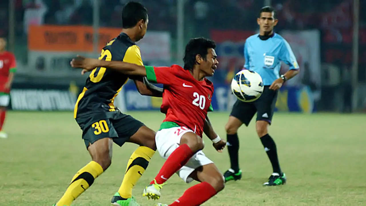 indo-vs-malaysia-130918c.jpg