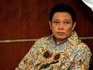 Direktur PT Dutasari Citralaras, Machfud Suroso mendengarkan pembacaan vonis oleh majelis hakim di Pengadilan Tipikor, Jakarta, Rabu (1/4/2015).Machfud dianggap melakukan tindak pidana korupsi dalam proyek P3SON Hambalang. (Liputan6.com/Yoppy Renato)