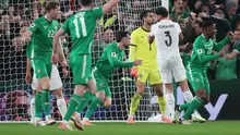 Troy Parrott merayakan golnya pada laga Irlandia melawan Portugal di Kualifikasi Piala Dunia 2026 zona Eropa - AP Photo/Peter Morrison
