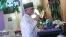 Ketua MPR Zulkifli Hasan memberikan sambutan di acara Buka Puasa Bersama di Rumah Dinasnya, Jakarta, Senin (22/6/2015). Presiden dan sejumlah tokoh Parpol tampak hadir dalam acara tersebut. (Liputan6.com/Faizal Fanani)