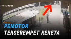 CCTV merekam detik-detik pemotor nekat menerobos rel kereta tak berpalang.
