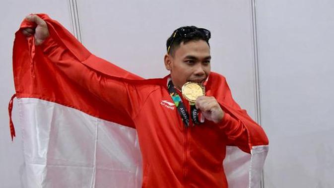 Eko Yuli Irawan, atlet angkat besi yang meraih emas di nomor angkatan 62 kg Asian Games 2018.