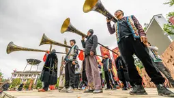 Ini adalah festival tradisional masyarakat Yi, Naxi, dan Bai di China. (AFP/STR)