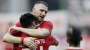 Pemain Persija Jakarta, Marko Simic dan Heri Susanto, merayakan kemenangan atas Barito Putra pada laga Liga 1 2019 di Stadion Patriot, Bekasi, Senin (23/9/2019). Persija menang 1-0 atas Barito Putra. (Bola.com/M Iqbal Ichsan)
