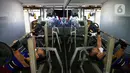 Pengunjung berolahraga di tempat pusat kebugaran Mark Gym di kawasan Tebet, Jakarta, Selasa (5/10/2021). Meski demikian, tetap diberlakukan pembatasan seperti jumlah pengunjung maksimal 25 persen.  (Liputan6.com/Faizal Fanani)