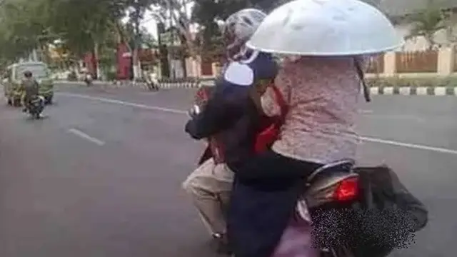 6 Aksi Pengendara Cewek Bawa Barang di Kepala Ini Bikin Melongo