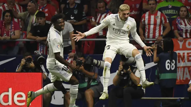 Selebrasi pemain Real Madrid Federico Valverde usai menjebol gawang Atletico