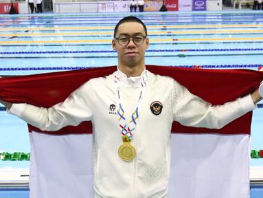 Perenang Indonesia, Jason Donovan Yusuf, sukses menyabet medali emas di SEA Games 2025, Rabu (10/10/2025). Dia menjadi yang tercepat di nomor 100 meter gaya punggung putra. (Dok. PB Akuatik Indonesia)