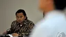 Tersangka kasus Vidiotron sekaligus  Direktur Utama PT Rifuel, Riefan Avrian duduk mendengarkan keterangan saksi di Pengadilan Tipikor, Jakarta, Kamis (13/11/2014)(Liputan6.com/Miftahul Hayat)
