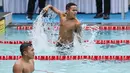 Atlet disabilitas asal Bali I Komang Denis Mahesa Putra melakukan selebrasi saat menjuarai laga cabang olahraga para renang nomor 50 meter gaya punggung putra S10 Pekan Paralimpiade Nasional (PEPARNAS) XVII Solo 2024, Jawa Tengah, di kolam renang Intanpari, Karanganyar, Selasa (8/10/2024). Denis meraih medali emas dengan catatan waktu 30.97 detik diikuti oleh atlet asal Jawa Barat Ramadoni (31.89 detik) serta atlet asal Sumatera Barat Muhammad Habib Alfadjri (32.79 detik). (PB PEPARNAS XVII/Wawan H Prabowo)