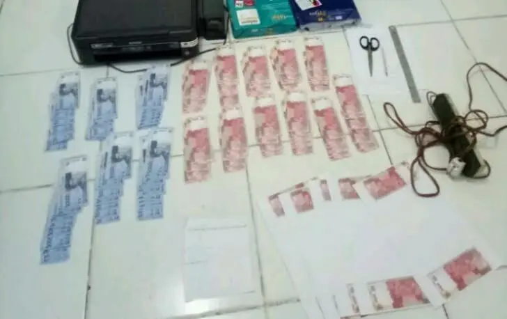 Uang palsu buatan petani di Riau (Liputan6.com / M.Syukur)