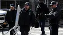 Trump akan muncul di pengadilan Manhattan pada Selasa untuk menghadapi tuntutan pidana dengan dikawal Secret Service. (Photo by Leonardo Munoz / AFP)