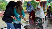 Tradisi "Ngacau Gelamai" merupakan cara warga Bengkulu mempertahankan kebiasaan bergotong royong (Liputan6.comYuliardi Hardjo)