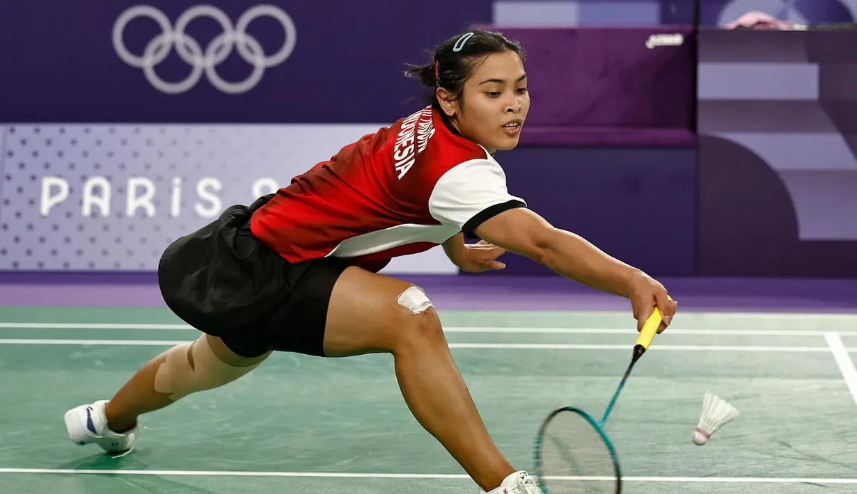 Laga antara Gregoria Mariska Tunjung melawan An Se Young berlangsung dramatis. (Luis TATO/AFP)