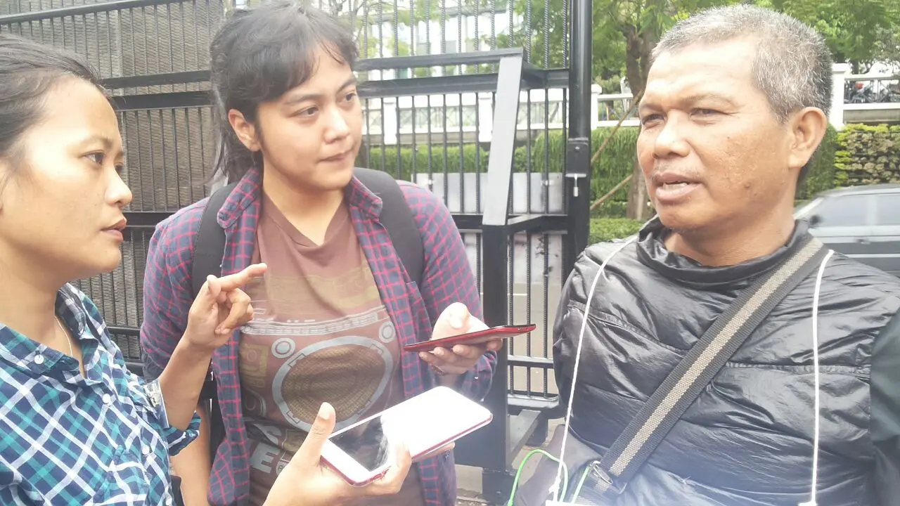 Rahmat, pengemudi ojek online, saksi pembunuhan dokter Letty (kanan). (Liputan6.com/Nafiysul Qodar)