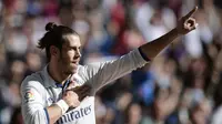 Ekspresi pemain Real Madrid, Gareth Bale, setelah mencetak gol ke gawang Leganes dalam laga La Liga di Stadion Santiago Bernabeu, Madrid, (6/11/2016). (AFP/Javier Soriano)