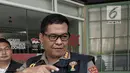 Ketua Tim Media Satgas Antimafia Bola Komisaris Besar Argo Yuwono memberikan keterangan pers terkait Penggeledahan kantor baru PSSI di FX Tower, Jakarta, Rabu (30/1). (Liputan6.com/Faizal Fanani)