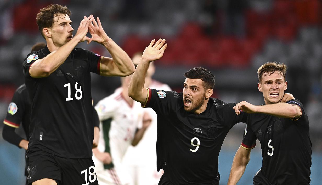 Timnas Jerman memastikan satu tempat di babak 16 besar Euro 2020 dengan dramatis. Mereka menduduki posisi kedua dalam Grup F usai bermain imbang 2-2 melawan Hungaria. (Foto: AP/Pool/Lukas Barth)
