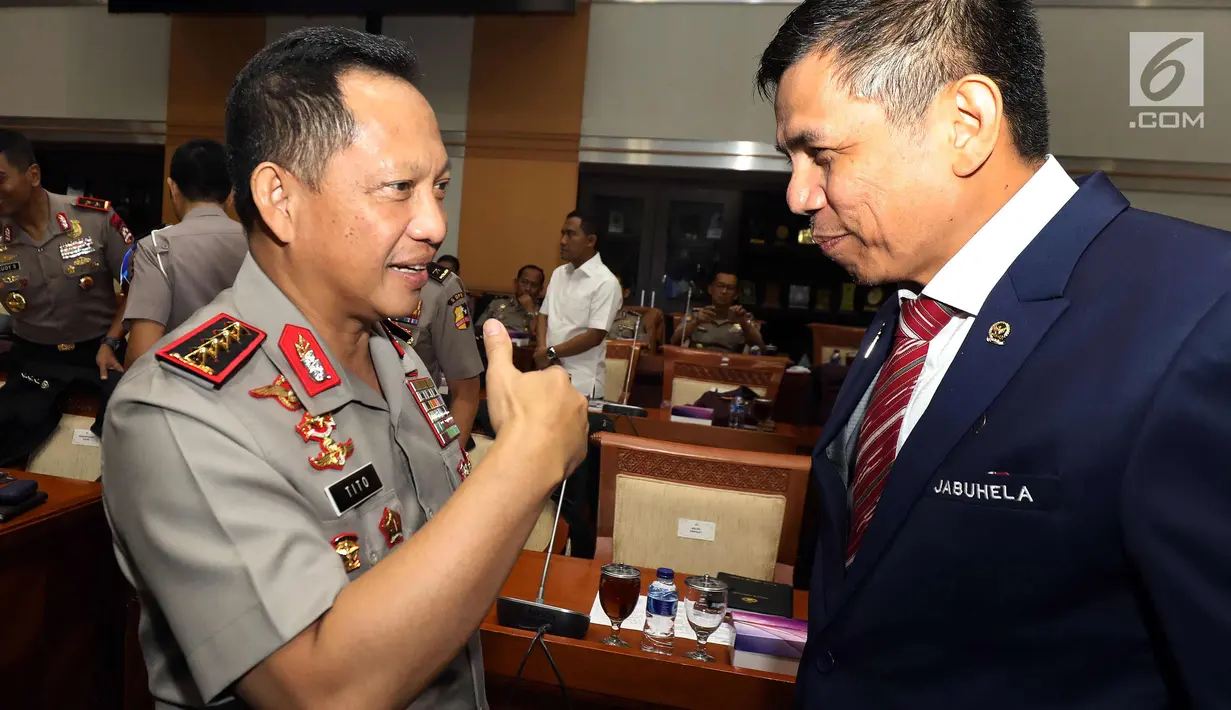 Kapolri Jenderal Pol Tito Karnavian usai mengikuti rapat kerja dengan Komisi III DPR di Kompleks Parlemen Senayan, Jakarta, Rabu (14/3). Rapat membahas persiapan Polri dalam pengamanan Pilkada Serentak 2018. (Liputan6.com/Johan Tallo)
