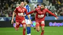 Pemain kelima alias terbaru yang mencetak hattrick di Ligue 1 2023/2024 adalah gelandang Prancis yang memperkuat Stade Brestois, Mahdi Camara. Pemain yang tengah menjalani musim pertama berseragam Stade Brestois ini membuat hattrick pada pekan teranyar Ligue 1 2023/2024, yaitu pekan ke-23 saat menang 3-0 atas tuan rumah Strasbourg (24/2/2024). Hingga pekan ke-23 Ligue 1 2023/2024 ia telah mencetak total 5 gol dan 3 assist dari 21 laga. (AFP/Sebastien Bozon)
