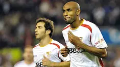 Sevilla's Malian Frederic Kanoute celebrates with Enzo Maresca after scoring against Recreativo Huelva during their Spanish League football match, on November 9, 2008 at the Sanchez Pizjuan stadium, in Seville. AFP PHOTO/ CRISTINA QUICLER 
