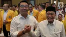 Ridwan Kamil - Suswono melakukan salam komando saat acara deklarasi bakal calon gubernur pada Pilkada DKI Jakarta 2024 di Hotel Sultan, Jakarta, Senin (19/8/2024). (Liputan6.com/Herman Zakharia)