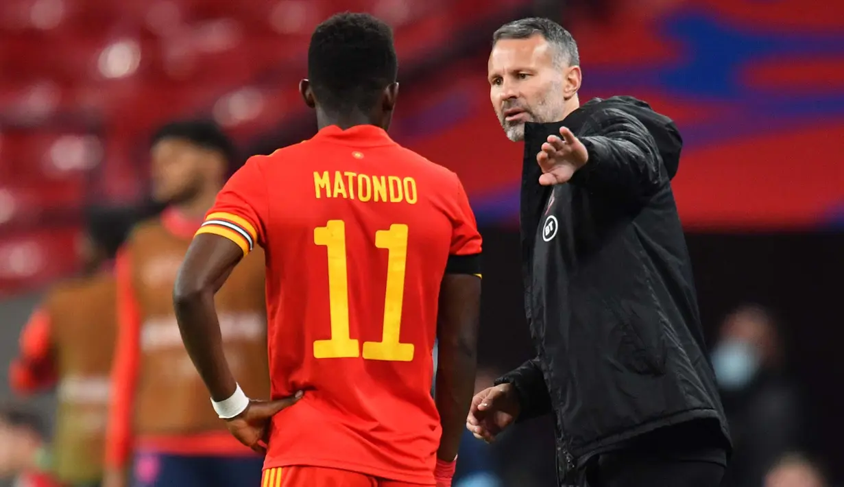 Setelah Giggs gantung sepatu pada 2014, barulah Timnas Wales bisa lolos ke Piala Eropa 2016. Giggs baru bisa menjadi bagian Timnas Wales di Piala Eropa setelah menjadi pelatih dan sukses membawa negaranya itu berlaga di Piala Eropa 2020. (Foto: AFP/Glyn Kirik)