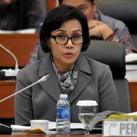 Menkeu Sri Mulyani Indrawati mengaku tidak gembira dengan pencapaian APBN 2015, termasuk opini Wajar Dengan Pengecualian (WDP) di Laporan Keuangan Pemerintah Pusat (LKPP) 2015 saat Raker dengan Banggar DPR, Jakarta,Kamis (25/8). (Liputan6.com/Johan Tallo)
