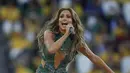 Aksi mantan istri Marc Anthony itu saat memeriahkan acara pembukaan Piala Dunia 2014 di Brasil, Kamis (12/6/14). (AFP PHOTO/Pedro Ugarte) 