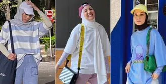 Oversize kaos jadi salah satu pakaian yang sangat wajib dimiliki para penggunan hijab. Beberapa publik figure ini pun mengenakan oversize kaos sebagai ootdnya, yuk intip untuk menginspirasimu.