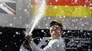 Semprotan sampanye Rosbergi podium juara. (AFP/Tom Gandolfini)