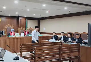 Mantan Ketua Ombudsman Hery Susanto menceritakan detik-detik penangkapan dirinya oleh Kejaksaan Agung pada 16 April 2026. (Liputan6.com/Dimas Ramadhan Wicaksana)