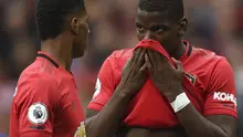 Pemain Manchester United, Marcus Rashford dan Paul Pogba. (AFP/Oli Scarff)