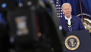 Biden sedang menghadiri misa di Gereja Katolik St. Edmond di Pantai Rehoboth, Delaware, ketika penembakan pada kampanye Trump terjadi. (SAMUEL CORUM / AFP)