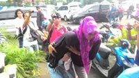 Penculik Salwa dan Salma saat digiring ke ruang penyidikan (Liputan6.com/Achmad Sudarno)
