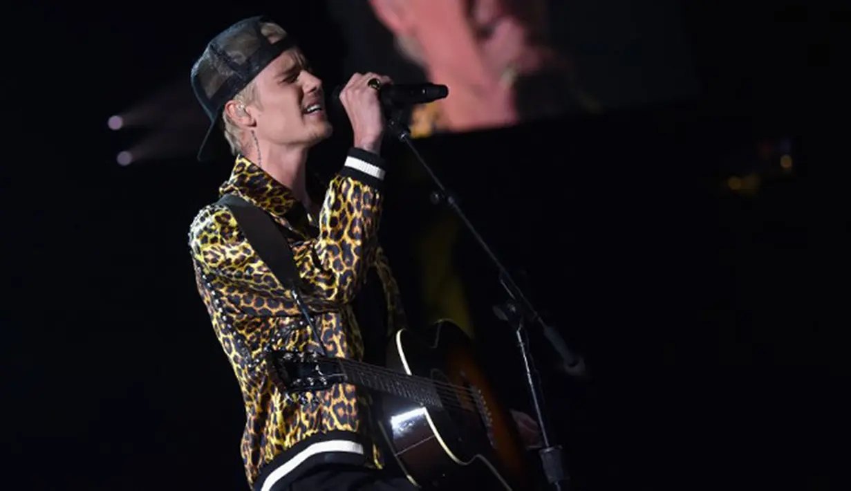 Justin Bieber kembali mengecewakan penggemarnya dengan kabar pembatalan konsernya baru-baru ini. Tidak sembarangan, Justin membatalkan konsernya lantaran memiliki alasannya tersendiri. (AFP/LARRY BUSACCA)