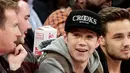 'Aku bangun sebelum acara hari itu dan aku mengalami rasa sakit di kakiku' kata Niall dalam sebuah video yang beredar di dunia maya. (Bintang/EPA)