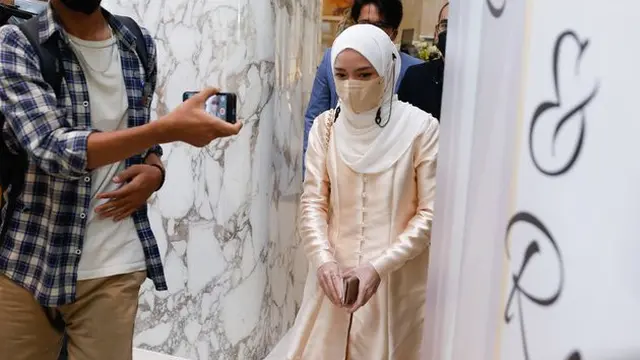 Wajah Nissa Sabyan dan Ayus terekam kamera pewarta datang ke acara pernikahan Ria Ricis dan Teuku Ryan (Kapanlagi/ Bayu Herdianto)