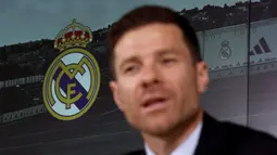 Xabi Alonso memberikan keterangan di depan media dalam konferensi pers perkenalan pelatih baru Real Madrid yang berlangsung di Real Madrid Sports City, Valdebebas, Spanyol, Senin (26/05/2025) waktu setempat. (AFP/Thomas Coex)