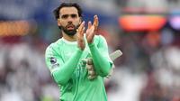 Kiper Arsenal, David Raya, bereaksi setelah pertandingan Liga Inggris antara West Ham dan Arsenal di London, Minggu, 10 Mei 2026. (Foto AP/Ian Walton)