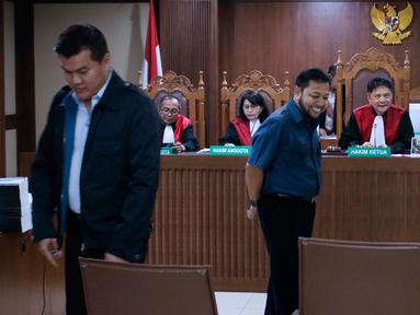 Terpidana kasus korupsi proyek e-KTP Andi Narogong, Setya Novanto dan Irvanto Hendra Pambudi Cahyo (kiri ke kanan) saat menjadi saksi dalam sidang lanjutan dugaan korupsi e-KTP dengan terdakwa Markus Nari di Pengadilan Tipikor, Jakarta, Rabu (2/10/2019). (Liputan6.com/Helmi Fithriansyah)