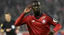 Penyerang Lille, Nicolas Pepe berselebrasi usai mencetak gol ke gawang Olympique Lyon pada pertandingan Liga Prancis di Stadion Pierre Mauroy di Villenueve d'Ascq pada 1 Desember 2018. (AFP Photo/Francois Lo Presti)