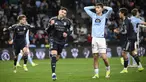 Gelandang Real Madrid asal Uruguay, Federico Valverde (kedua kiri), merayakan golnya saat pertandingan pekan ke-27 La Liga 2025/2026 melawan Celta Vigo di Estadio Abanca-Balaidos pada Jumat 6 Maret 2026 waktu setempat atau Sabtu 7 Maret 2026 dini hari WIB. Real Madrid meraih kemenangan dramatis 2-1 atas Celta Vigo. (Miguel RIOPA/AFP)