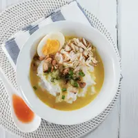 ilustrasi bubur ayam kuah kuning/Risya Septiana Kurniawati/Shutterstock