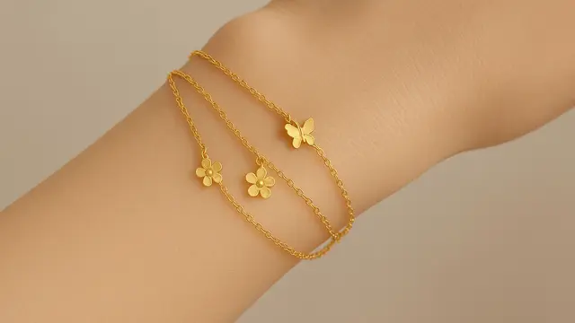Model Gelang Emas 2 Gram 16 Karat Motif Bunga dan Kupu-Kupu/Ilustrasi AI