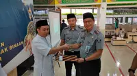 Pemerian remisi hari raya Idul Fitri kepada narapidana Rutan Depok. (dokumen Rutan Depok)